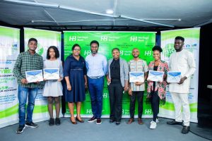 L-R: Certificate recipients of Ynsprye Project- Oluwasegun Ikoya; Deborah Johnson; Ozena Utulu, Head, Brand Management and Sustainability Heritage Bank; Fela Ibidapo, Divisional Head, Corporate Communications; Uchenna Mike Olisa, Head Product Development, Heritage Bank; other recipients- Derrick Ugwuegbu; Ayomide Soloja and Abayomi Bello, during the graduation and Certificate presentation to the 1st batch of Project Ynspyre graduates, as the bank partners Silverbird Group in Lagos.