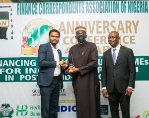 L-R: Blaise Udunze, Team Lead Media and External Relations of Heritage Bank Plc; former Managing Director of Bank of Industry, Waheed Olagunju and the Chairman of Finance Correspondents Association of Nigeria, Titus Nwokoji, during the duo Platinum Awards presented to Ifie Sekibo and Heritage Bank for Outstanding Support towards FICAN and Financial Reporting, respectively at the Finance Correspondents Association of Nigeria’s (FICAN) 30th-anniversary conference and awards with the theme: “Financing Infrastructure & SMEs for inclusive growth in the post-COVID-19 economy,” held in Lagos, weekend.