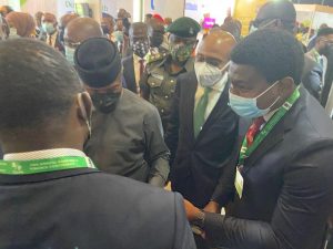 Vice President Professor Yemi Osinbajo, flanked by the Central Bank Governor Godwin Emefiele, and Dana Air's Head Corporate Communications during the VP's visit to Dana Air stand at the 14th Annual Banking and Finance Conference by the Chartered Institute of Bankers of Nigeria (CIBN) recently in Abuja.