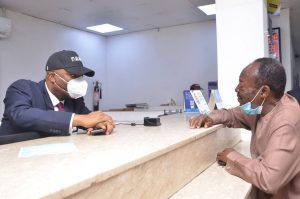 Ecobank Nigeria number 1 Teller, Patrick Akinwuntan, was on Thursday at Western Avenue branch of the bank in Lagos attending to customers in commemoration of the Customer Service Week.