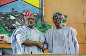 Sanwo-Olu in a warmly handshake with Obasa